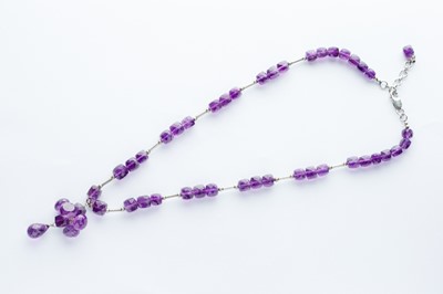 Lot 89 - An Amethyst Faceted Bead & Silver Necklace