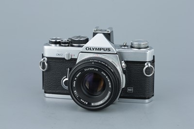 Lot 253 - An Olympus OM-2 SLR Camera