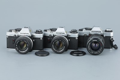 Lot 271 - Three Olympus OM SLR Cameras