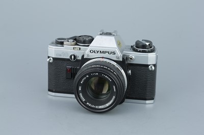 Lot 271 - Three Olympus OM SLR Cameras