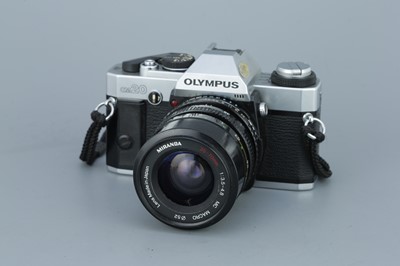 Lot 271 - Three Olympus OM SLR Cameras