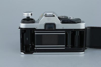 Lot 271 - Three Olympus OM SLR Cameras