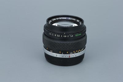 Lot 259 - An Olympus Zuiko MC Auto-S f/1.4 50mm Lens