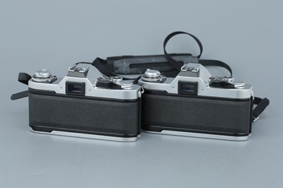 Lot 293 - Two Canon AV-1 SLR Cameras