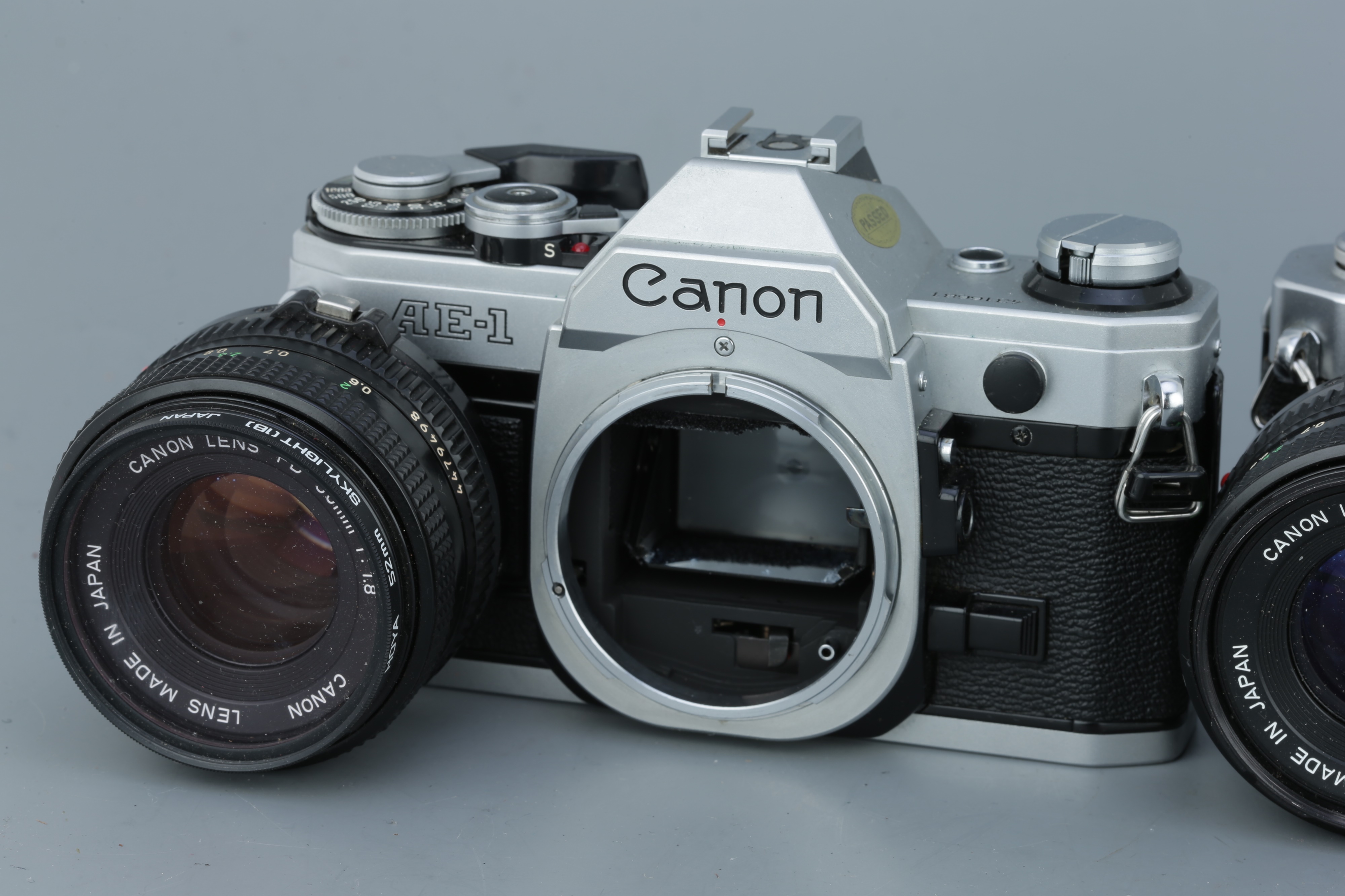 Slr Camera Design Lot 296 - Three Canon SLR Cameras