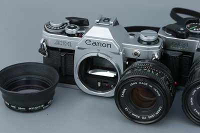 Lot 297 - Three Canon SLR Cameras