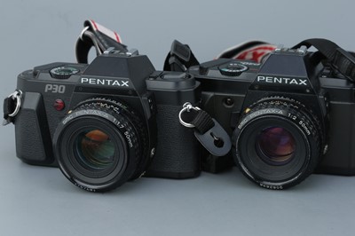 Lot 322 - Four Pentax SLR Cameras