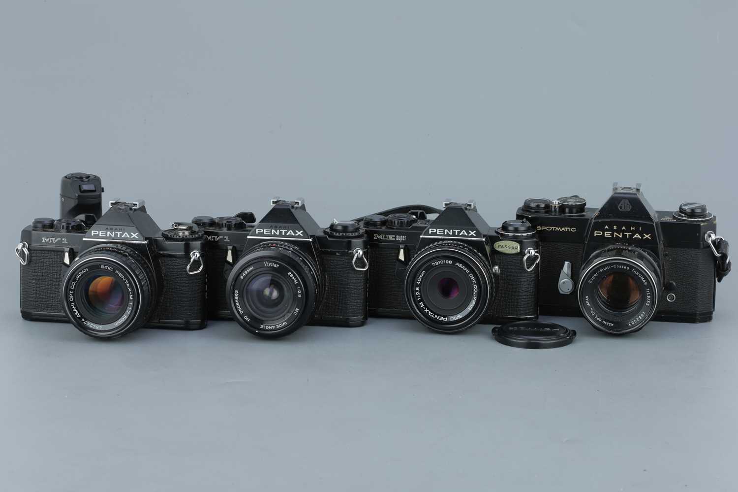 Lot 316 - Four Black Paint Pentax SLR Cameras