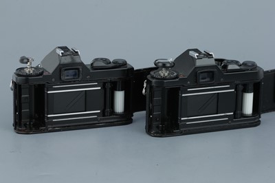 Lot 316 - Four Black Paint Pentax SLR Cameras