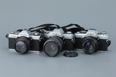 Lot 369 - Three Minolta 35mm SLR Cameras