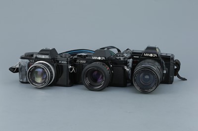 Lot 365 - Three Minolta 35mm SLR Cameras