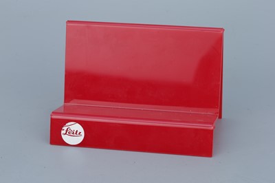 Lot 201 - Three Red Acrylic Leica Display Stands