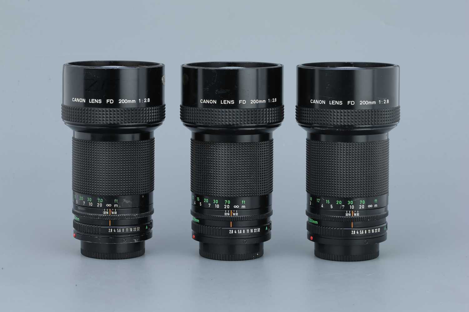 Lot 307 - Three Canon FD f/2.8 200mm Lenses