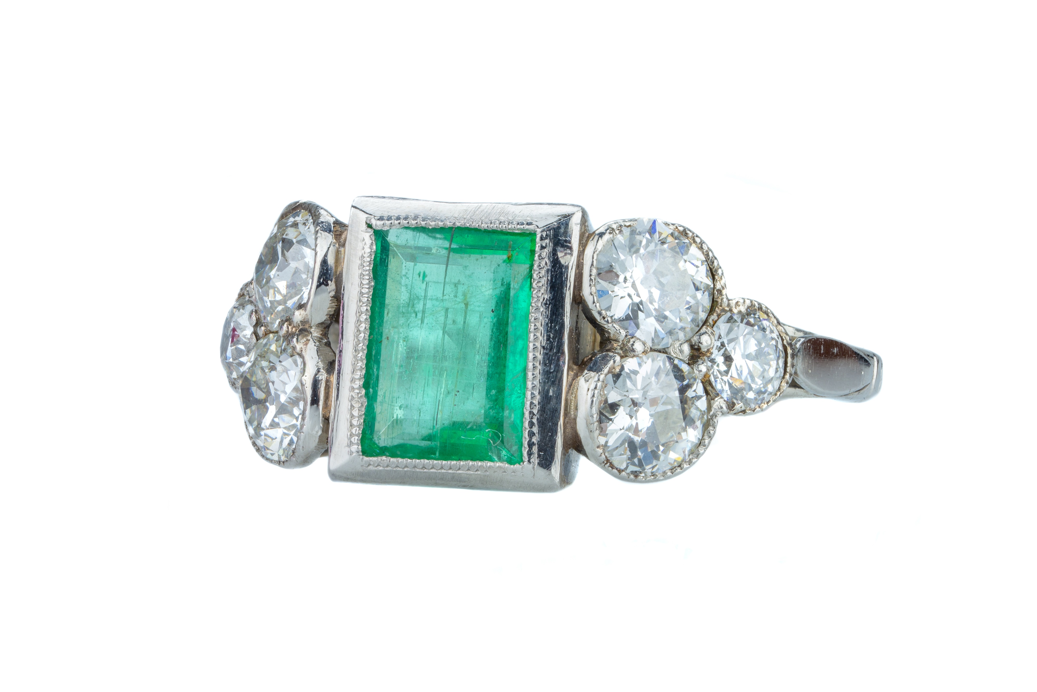 Lot 9 - An Art Deco emerald and diamond ring.