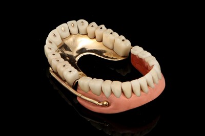 Lot 131 - A Complete Set of Gold & Porcelain Sprung Dentures
