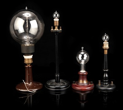 Lot 150 - Four Early Electric Lamps