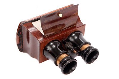 Lot 234 - A Hand-Held Stereoscope