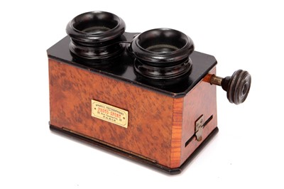 Lot 236 - A Hand-Held Stereoscope